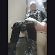 A pretty, blonde, British girl records herself pissing and shitting while sitting on a toilet in a public restroom. Plops are heard despite the chatter in the background. She wipes when finished. Presented in 720P vertical HD format. Over 2 minutes.